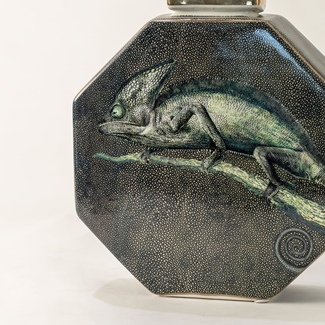 Dark green ceramic jar with engraved horse artwork in a front view perfect for rustic décor themes and stylish tabletop placement.