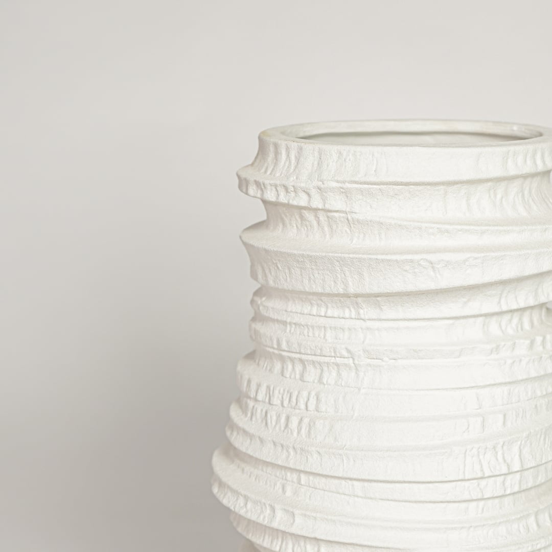 White ceramic decorative vase with sculpted layered texture perfect for elegant dried floral display and modern interior decor.