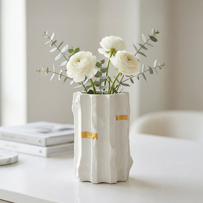 White ceramic decorative vase with flowers placed on table modern vase for living room shelf decor styling.