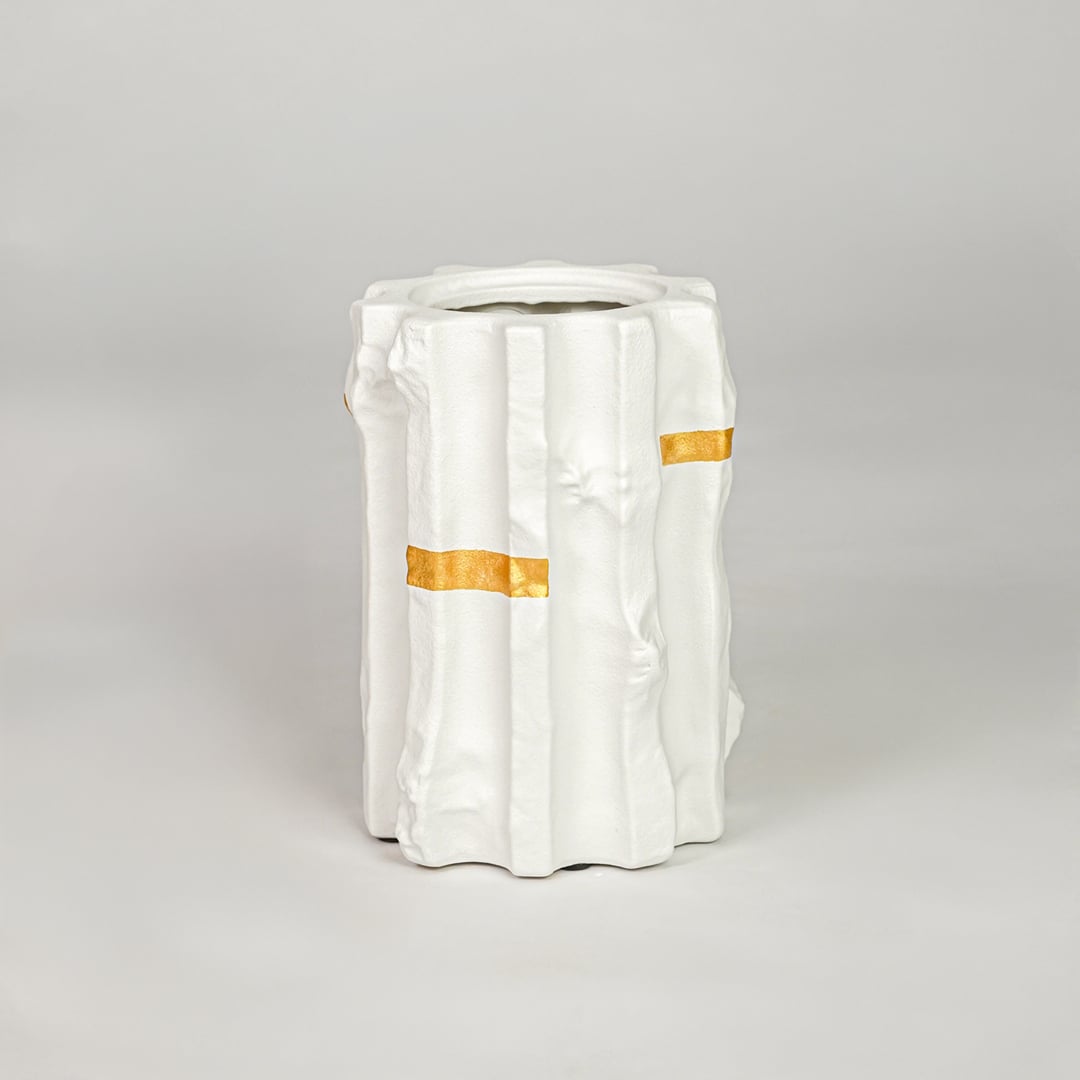 White ceramic decorative vase with gold accent modern flower vase for shelf console table living room home decor styling.