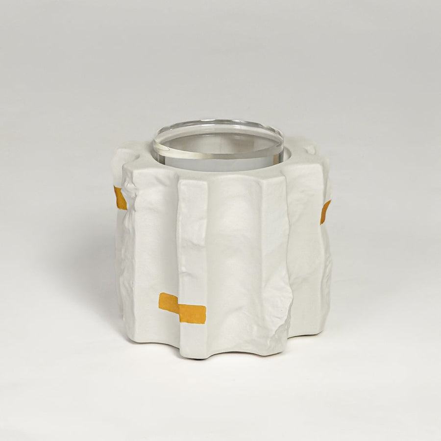 Modern white ceramic flower vase with gold accents and glass inner lining isolated on clean white background for home decor styling.