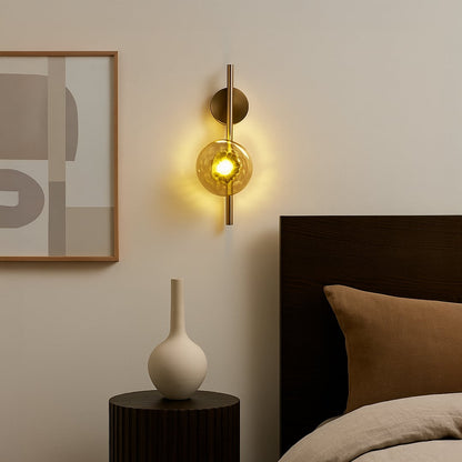 Gold metal wall light lifestyle image in modern bedroom with warm ambient lighting and elegant interior decor.