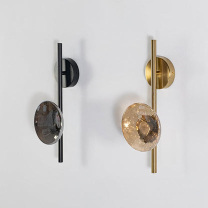 Black wall lights with smoked textured glass shades shown on a bright white background with lights off for clarity.