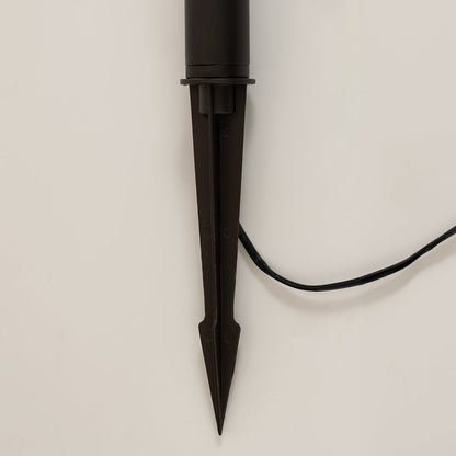 Detailed closeup of brown outdoor spike lantern highlighting its frosted panels geometric frame and solar top ideal for decorative landscape lighting.