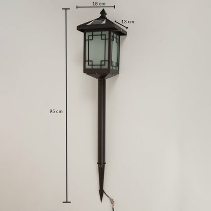 Brown solar garden spike lantern with frosted patterned glass shown with 95 cm height 18 cm width and 13 cm depth providing accurate outdoor installation sizing.