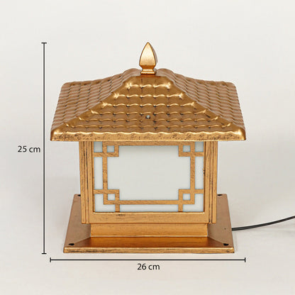 Traditional outdoor pillar lamp with gold finish and geometric frame design on neutral background 25 cm height 26 cm width perfect for garden or gate lighting.