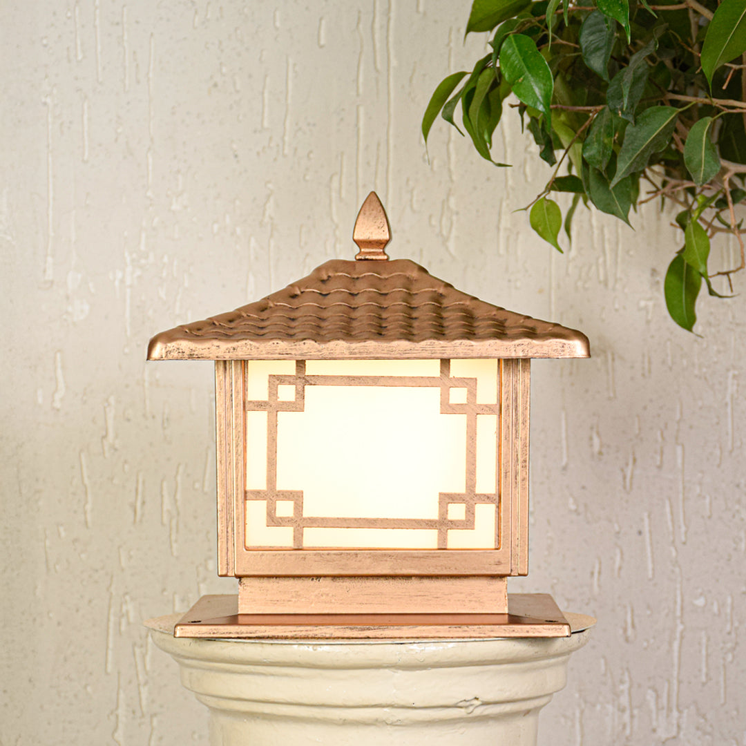 Decorative outdoor pillar light with Asian style wooden frame and glass panels on neutral background perfect for landscape and exterior decor lighting.