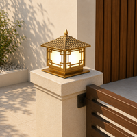 Antique gold metal pagoda gate pillar light for main entrance boundary wall decoration and traditional home exterior design.