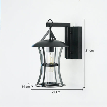 Black outdoor wall lantern with clear glass enclosure mounted on neutral wall background 31 cm height 27 cm width 19 cm depth perfect for exterior lighting.