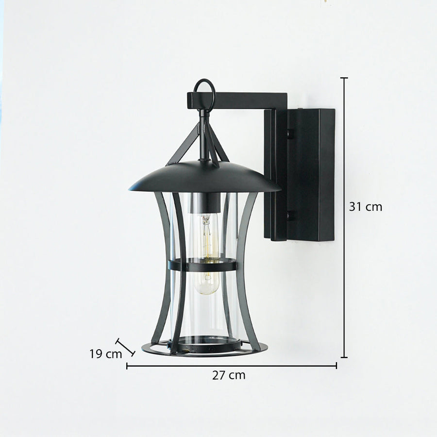 Black outdoor wall lantern with clear glass enclosure mounted on neutral wall background 31 cm height 27 cm width 19 cm depth perfect for exterior lighting.