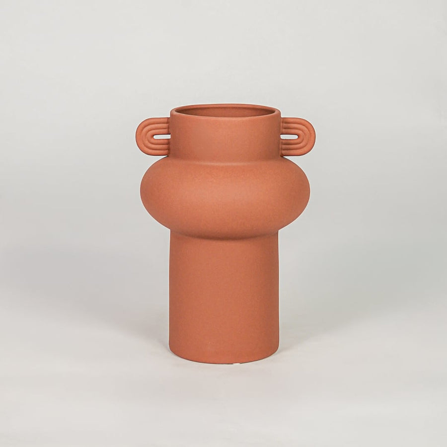 Orange ceramic decorative flower vase with matte finish modern vase for tabletop shelf console living room home decor styling.