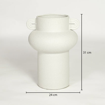 White ceramic decorative vase with sculptural handles showing 31 cm height and 24 cm width suitable for table or console placement.