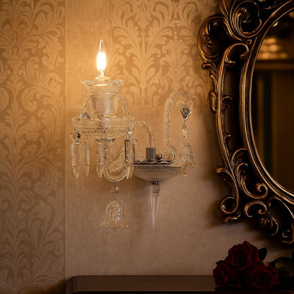 Crystal wall light glowing in vintage interior with classic furniture golden wallpaper and mirror decor.