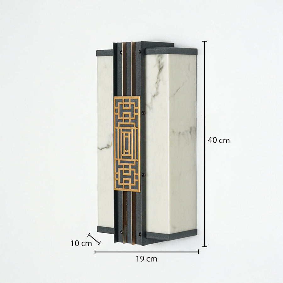 Modern wall light with marble finish panels and gold geometric detail on neutral background 40 cm height 19 cm width 10 cm depth perfect for exterior lighting decor.