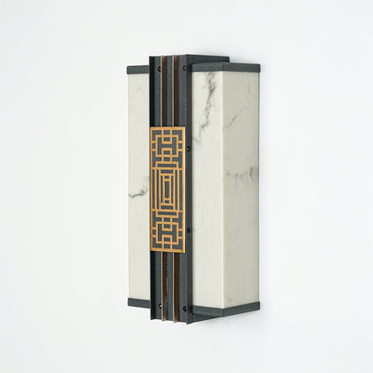 Minimal outdoor wall lantern with geometric pattern and glass enclosure perfect for modern patio or entryway lighting.

