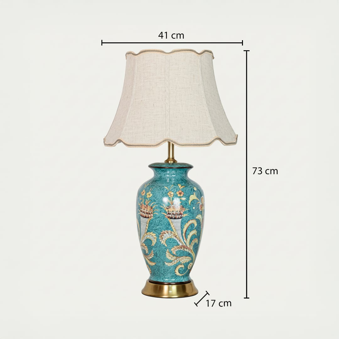 Teal ceramic table lamp showing 73 cm height 41 cm shade width and 17 cm base size ideal for bedside placement.