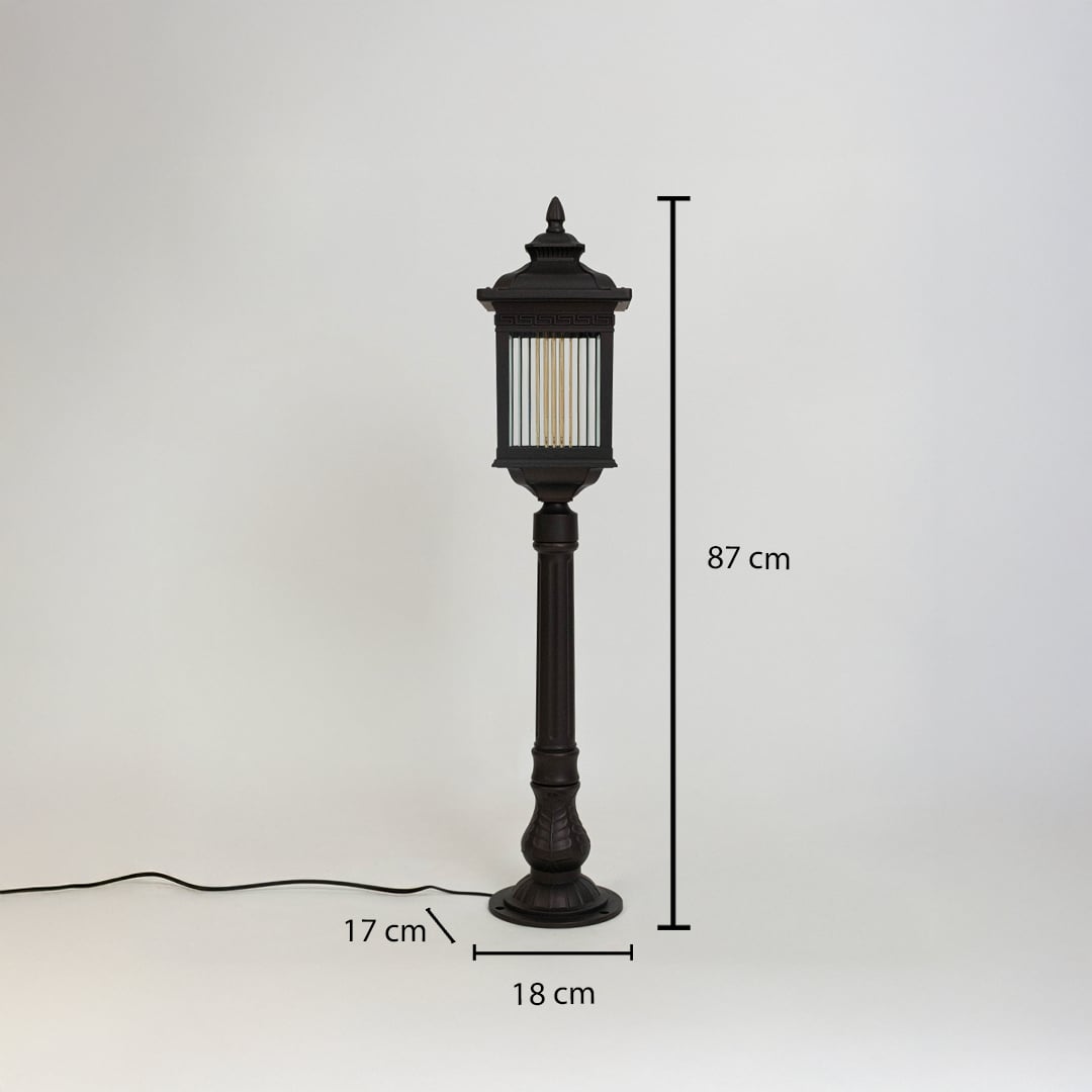 A black outdoor bollard light on a white background with dimensions clearly marked showing a height of 58 cm a top width of 13 cm and a base width of 12 cm illustrating its proportional structure.