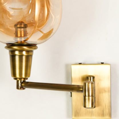 Closeup image of classy swivel two arm antique bedside wall light for elegant bedroom decor styling and home room interior.