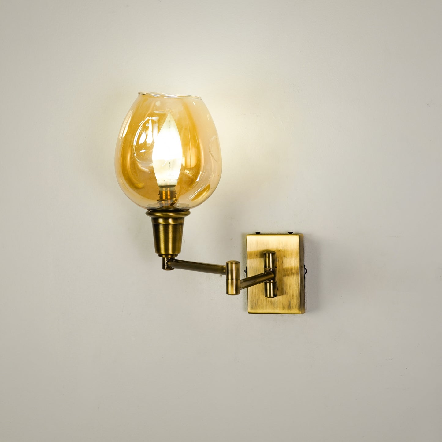White background image of classy swivel two arm antique bedside wall light for elegant bedroom decor and home decoration.
