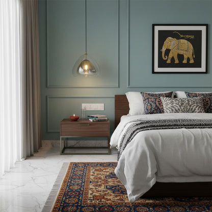 Elegant glass pendant light glowing warmly beside a modern bed with soft bedding and patterned pillows enhancing the cozy bedroom atmosphere beautifully.