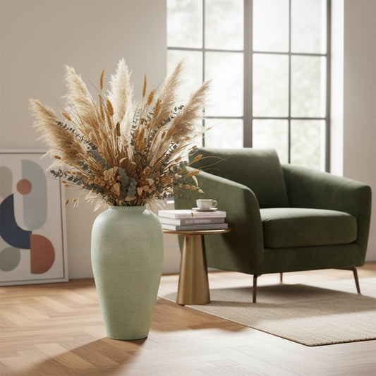 Mint green textured ceramic vase adding modern decor charm to living room spaces with tall elegant design perfect for styling corners.