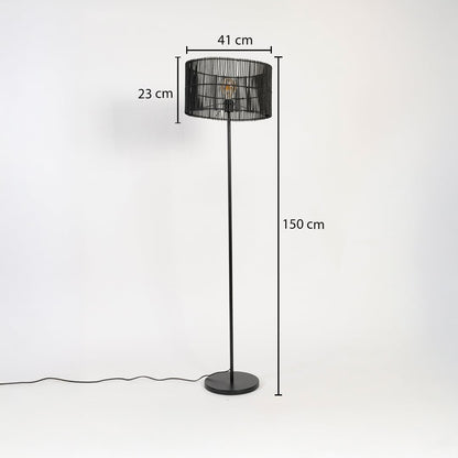 Black floor lamp with woven rattan shade measuring 150 cm height 41 cm width and 23 cm shade depth.