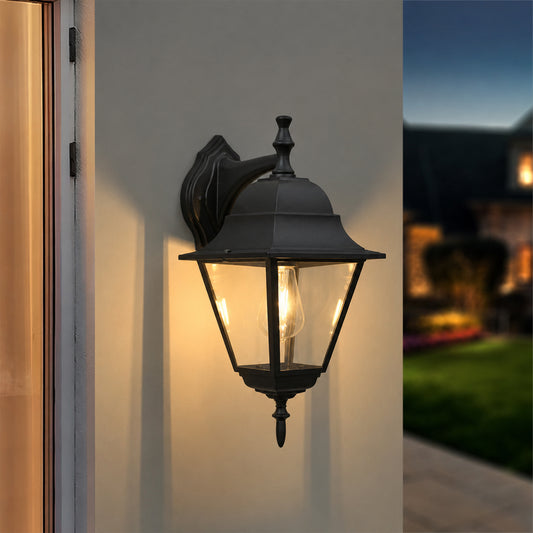 Black metal outdoor lantern wall light lifestyle image with warm lighting for stylish exterior wall decor.