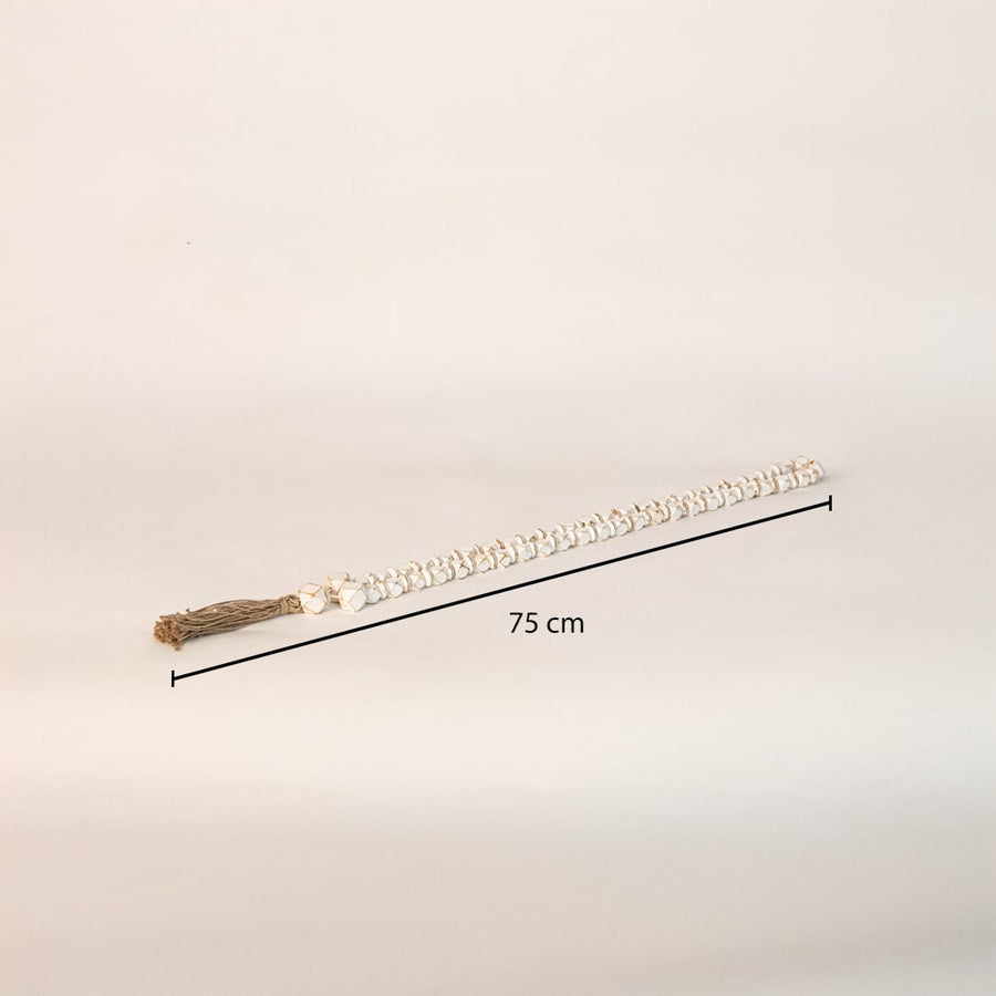 White bead garland measuring 75 cm in length perfect for tabletop styling or wall hanging decor.