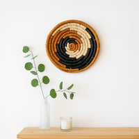 Lifestyle image of coastline charm handwoven sabai grass hanging wall basket for elegant home decor and modern room styling.