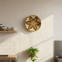 Lifestyle image of coastline charm handwoven sabai grass hanging wall basket for elegant home decor and modern interior room.