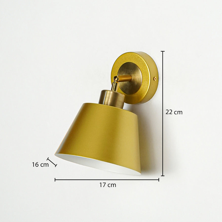Gold metal wall light with cone shade sized 22 cm height 17 cm width and 16 cm depth ideal for interior wall decor.