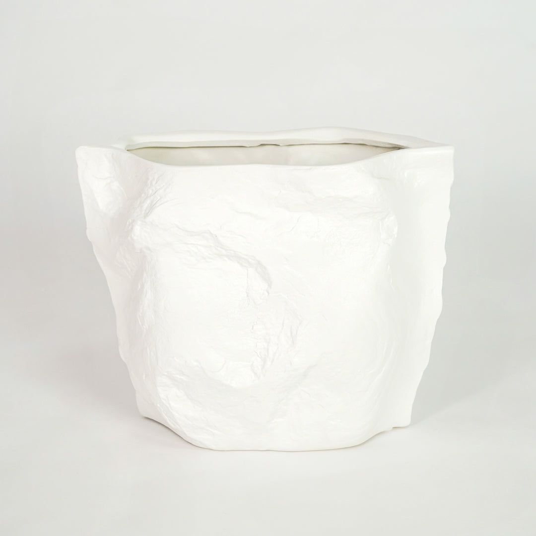 White textured ceramic planter pot for minimalist bedroom shelf placement and modern indoor decor styling display art.