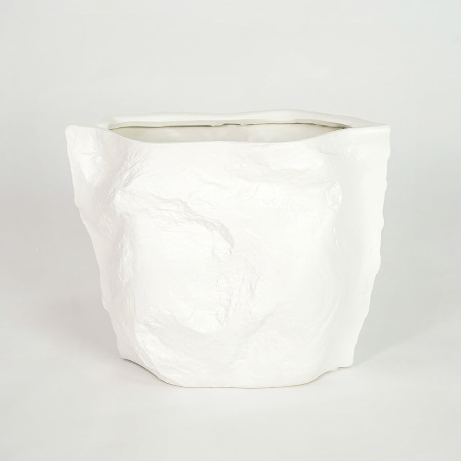 White textured ceramic planter pot for minimalist bedroom shelf placement and modern indoor decor styling display art.