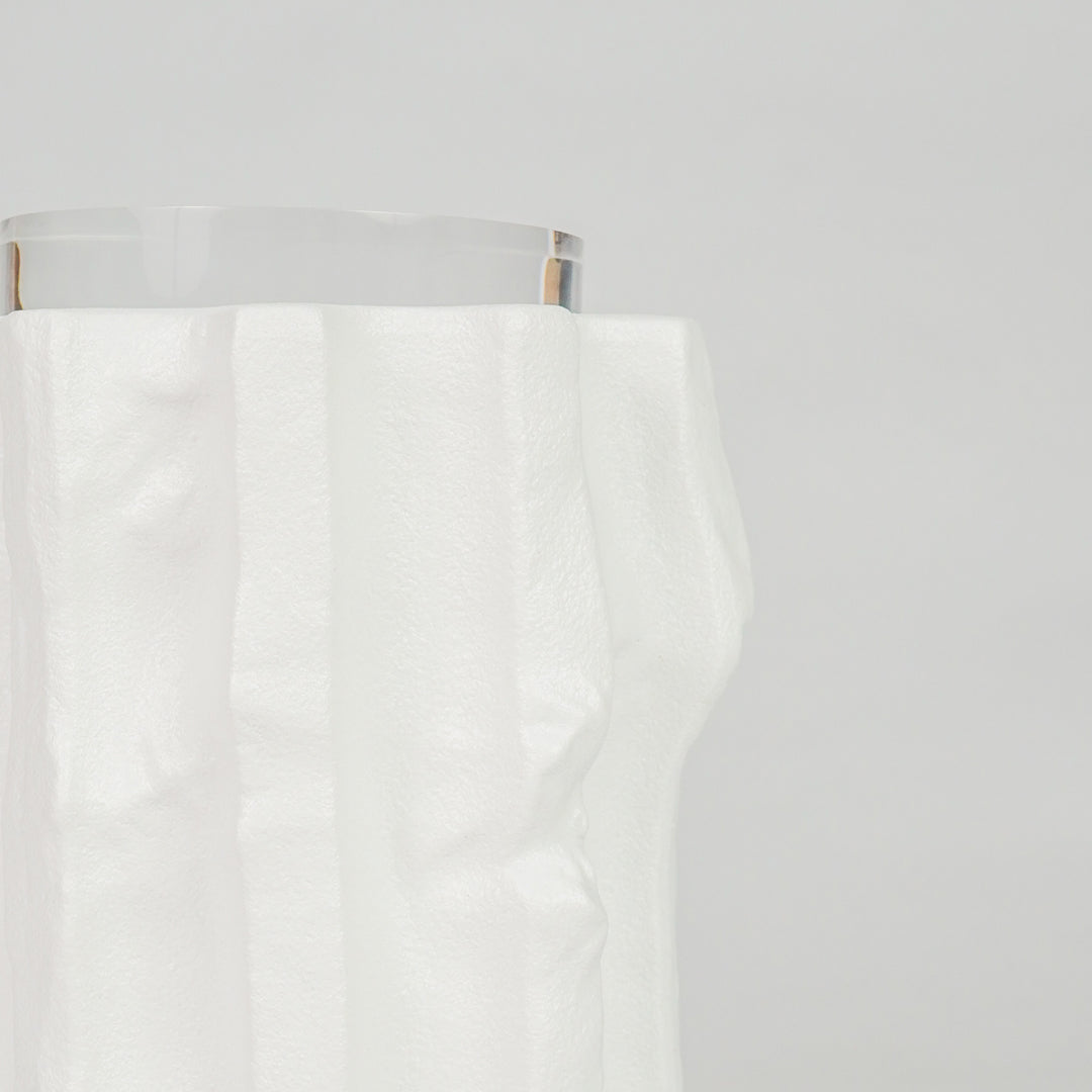 Closeup image of white ceramic modern vase for elegant tabletop decor styling with smooth artistic finish display.