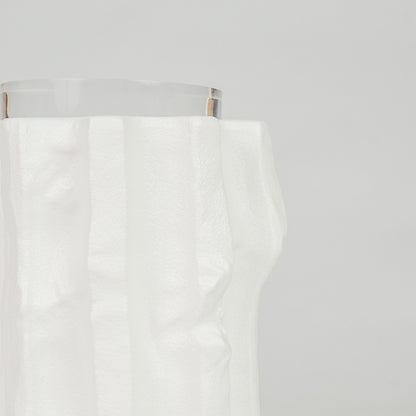 Closeup image of white ceramic modern vase for elegant tabletop decor styling with smooth artistic finish display.