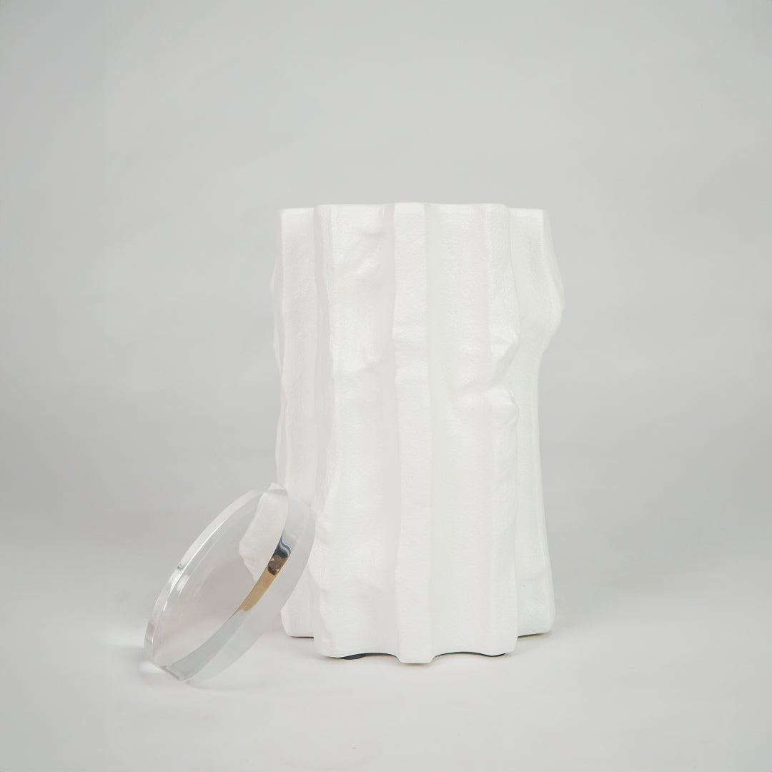 White textured ceramic candle jar for modern coffee table placement and elegant indoor decor styling accent piece.