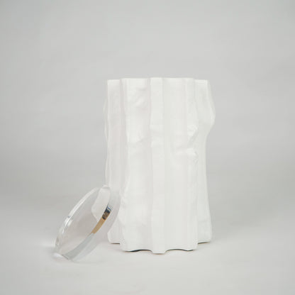 White textured ceramic candle jar for modern coffee table placement and elegant indoor decor styling accent piece.