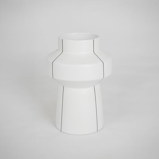 White modern ceramic vase for elegant coffee table placement and contemporary indoor decor styling accent piece.