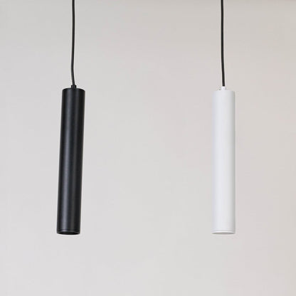 White tubular pendant lights displayed together on a white background with lights off showing minimalist style.