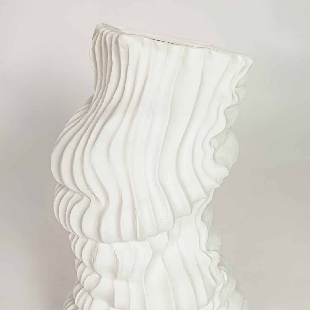 White ceramic abstract textured vase with artistic wave pattern perfect for elegant dried flower display and modern interior decor styling.