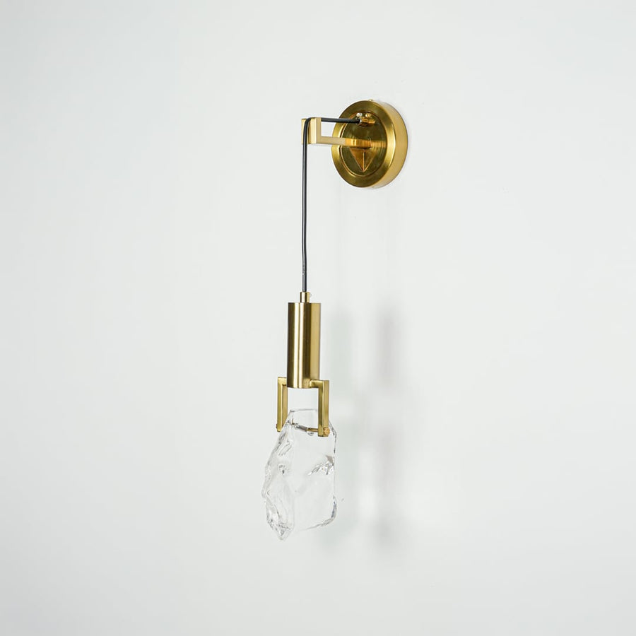Gold metal wall light with crystal glass shade for elegant modern bedroom and hallway lighting decor styling.