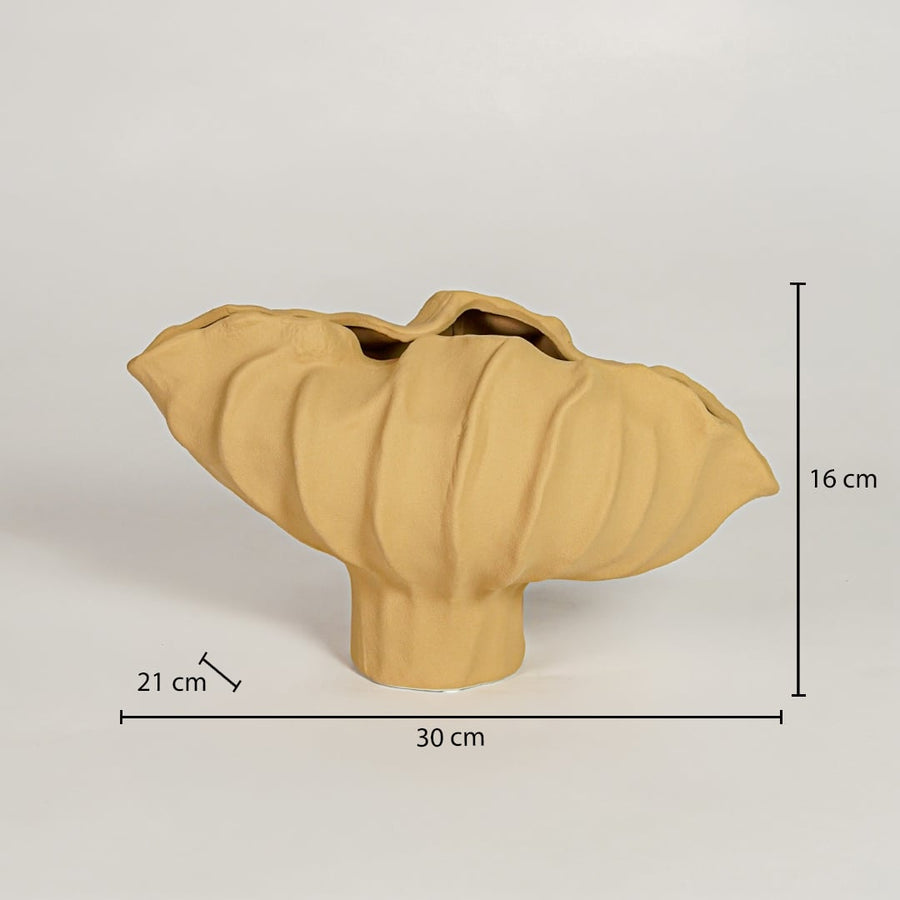 Yellow ceramic sculpted decorative bowl measuring 16 cm height 30 cm width and 21 cm depth ideal for modern tabletop decor styling.