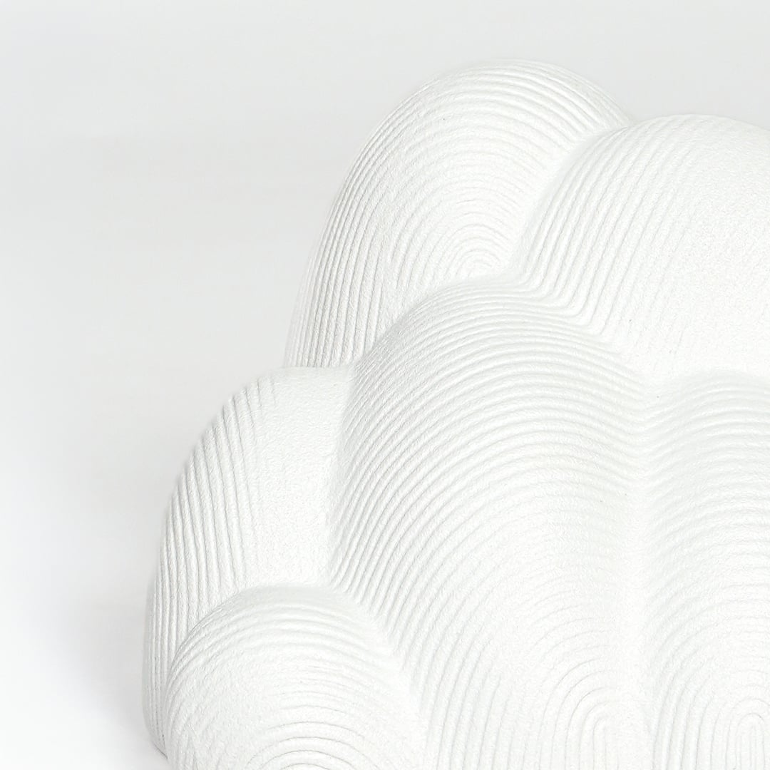 Textured white ceramic abstract art sculpture for elegant shelf and console decor styling.