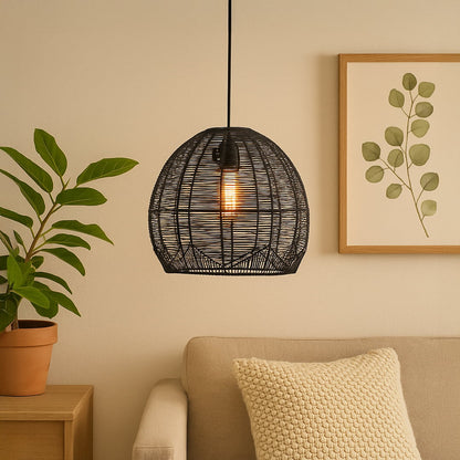 Modern black rattan pendant light beautifully styled in contemporary interiors creating a cozy and elegant ambient atmosphere.