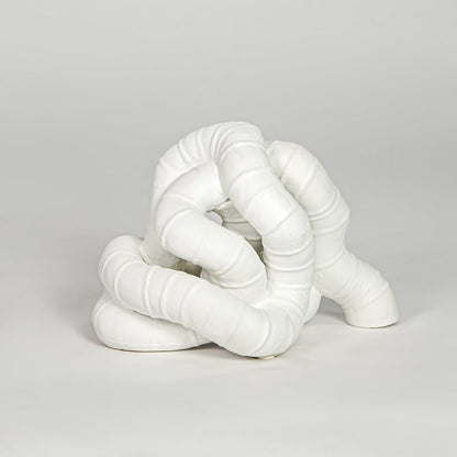 White ceramic abstract decor sculpture modern decorative showpiece for table console shelf living room decor styling.
