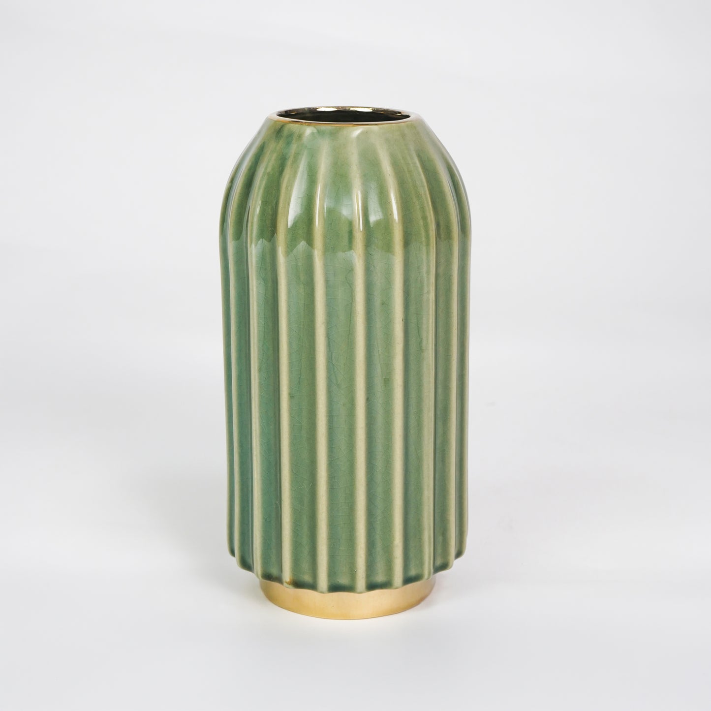 White background image of green gold ceramic vase for elegant tabletop decor styling with modern smooth painted finish.
