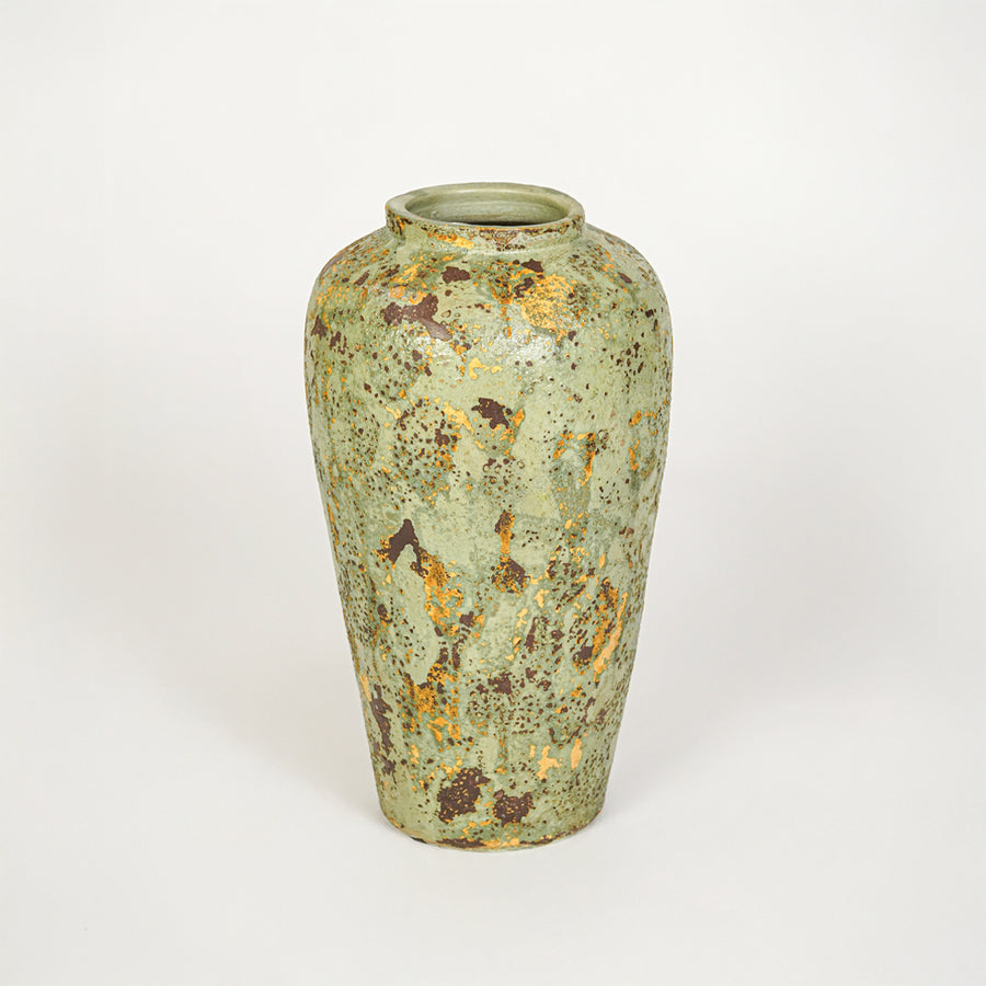 White background image of green ceramic floor vase for elegant interior decor styling with textured artistic finish.