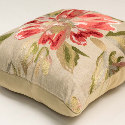 Floral cushion cover closeup showcasing detailed red flower print and textured fabric weave for decorative home accent use.