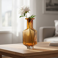 Amber art glass vase styled on living room console modern decorative glass accent for shelf table or center styling home.