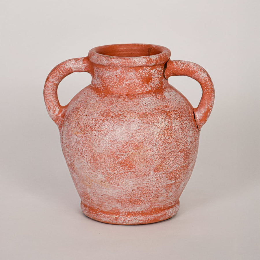 Decorative terracotta ceramic vase with antique white washed texture shown on white background emphasizing artisanal appeal.